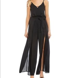 Size 3 Black Split Leg Jumpsuit. GORGEOUS